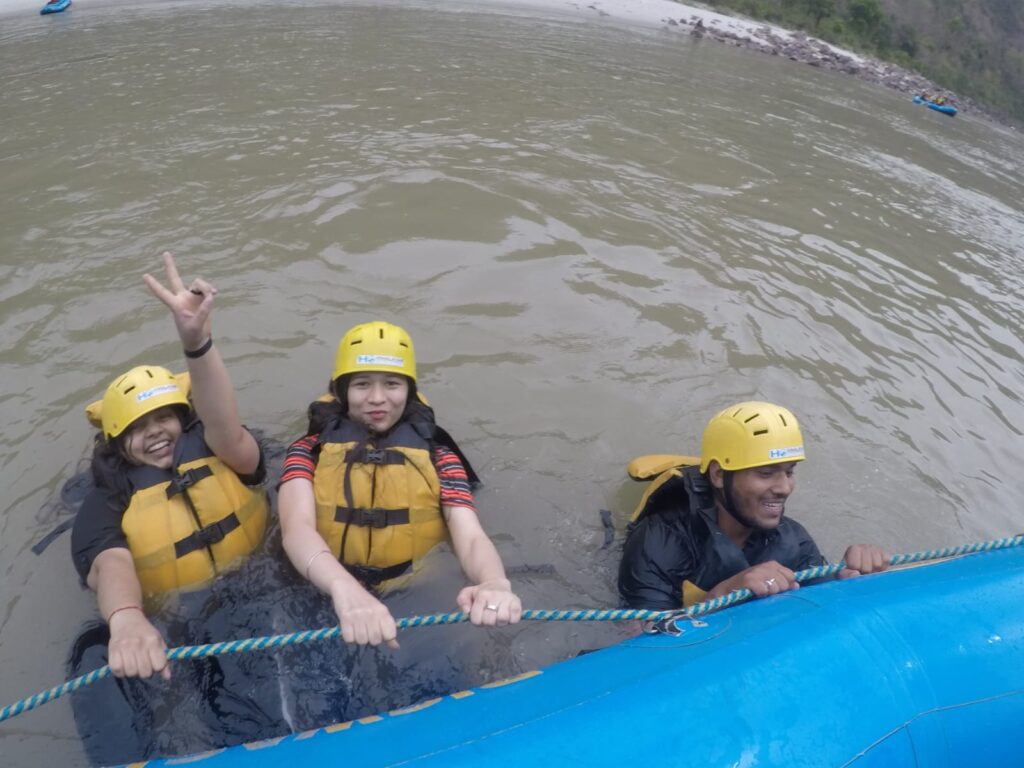 Tourists river rafting in Rishikesh on the Ganga River